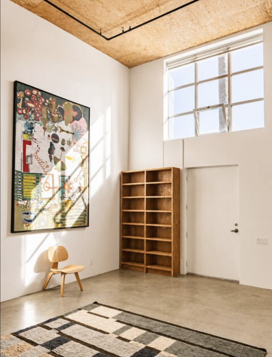 Corner of the home with a large William Attaway painting
